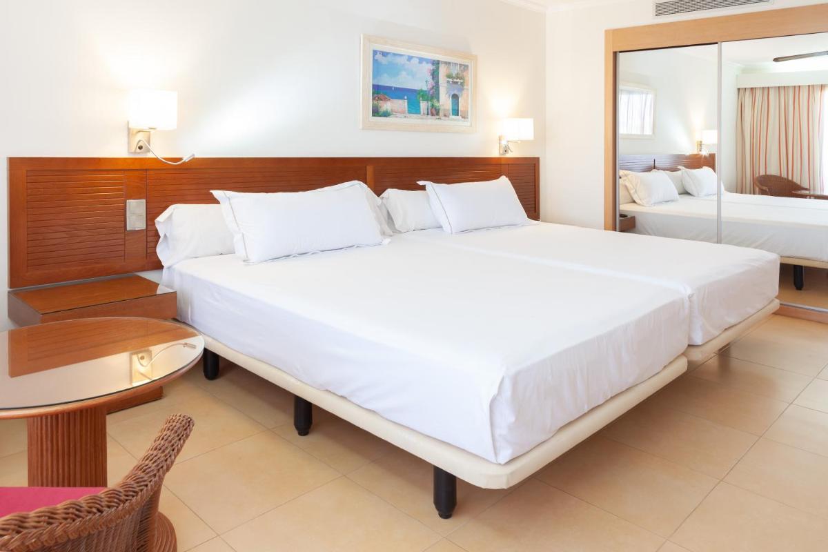 Cama o camas de una habitación en Playamarina