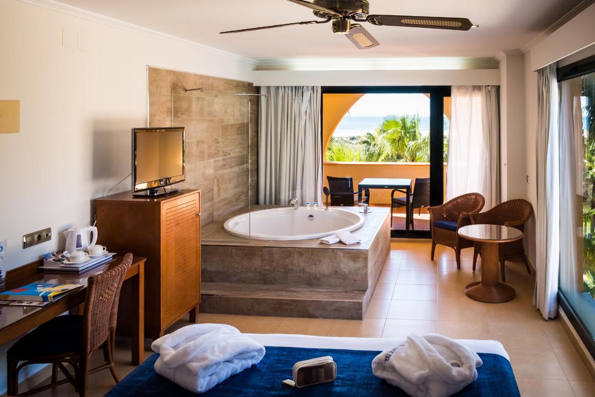 Cama o camas de una habitación en Playamarina