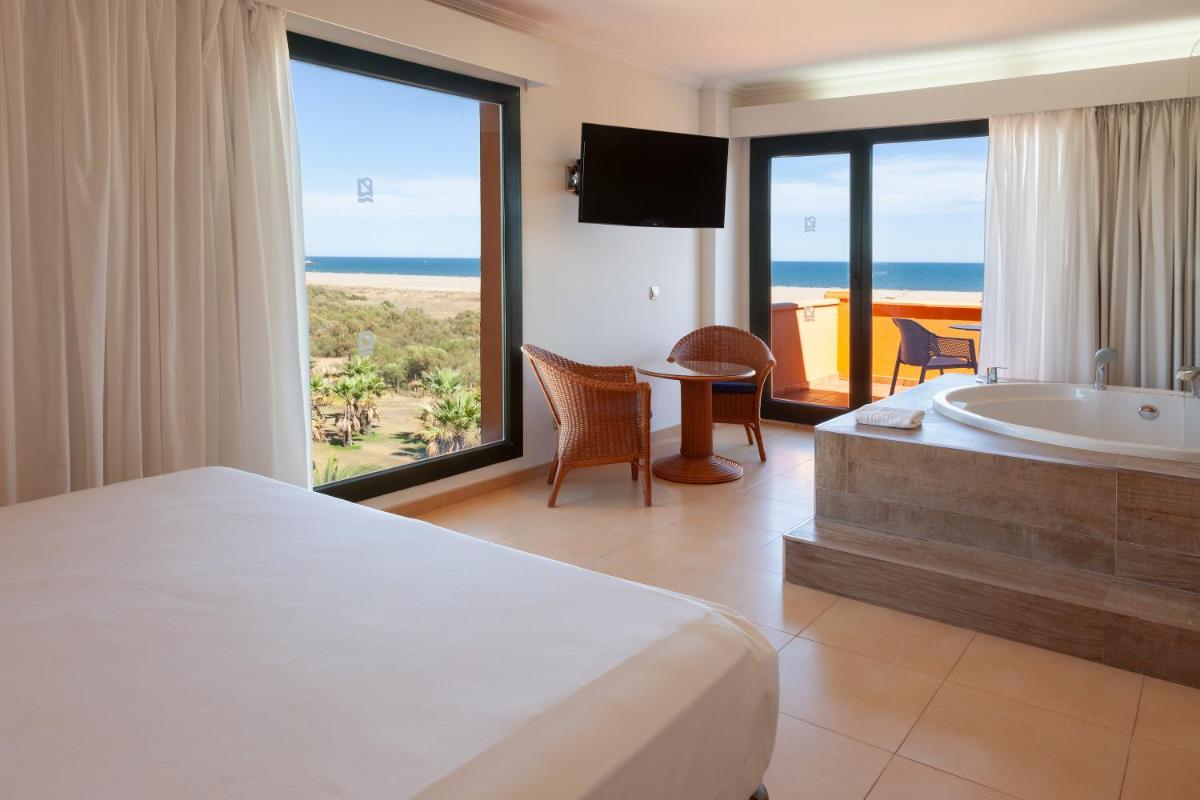 Cama o camas de una habitación en Playamarina