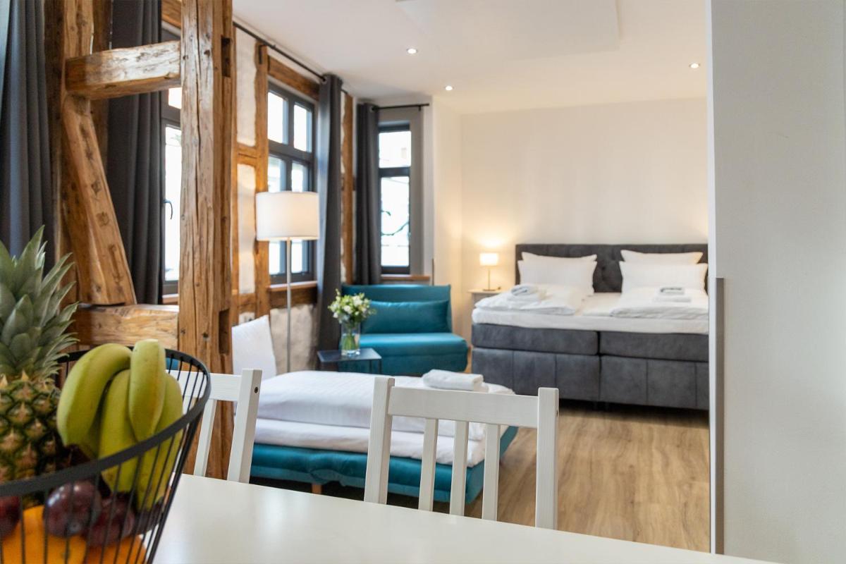 Schiefer Suite Hotel & Apartments - Housity