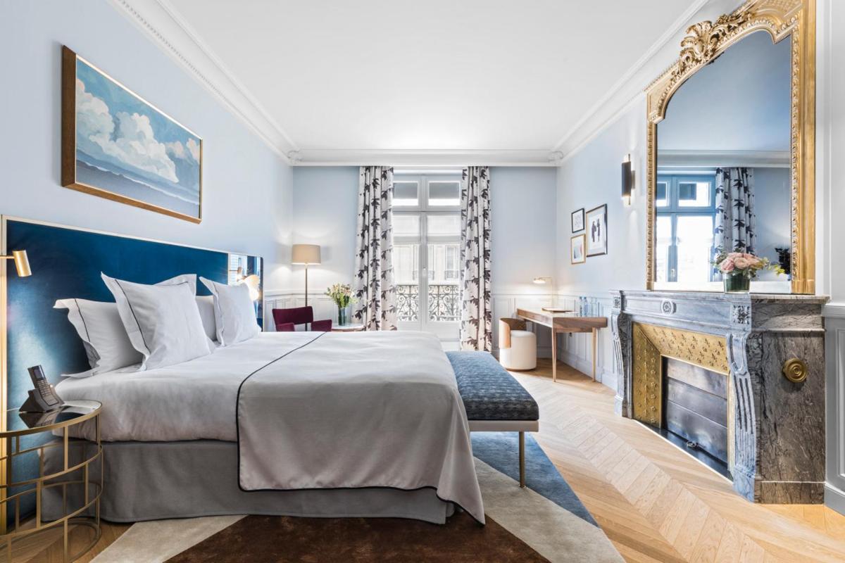 Un ou plusieurs lits dans un hébergement de l'établissement Grand Powers Hotel