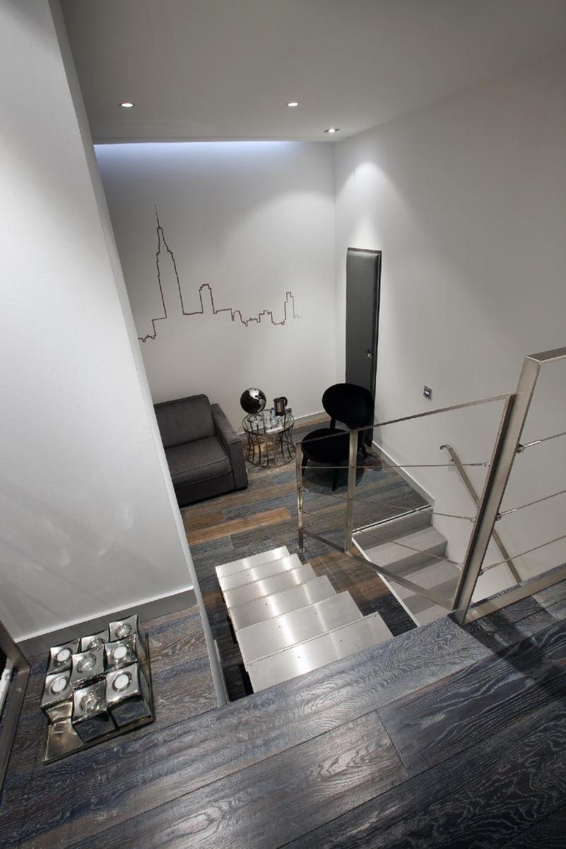 Coin salon dans l'établissement Petit Hôtel Confidentiel