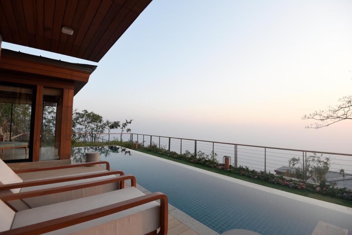 a swimming pool with a view of the ocean at The Westin Resort & Spa Himalayas in Rishīkesh