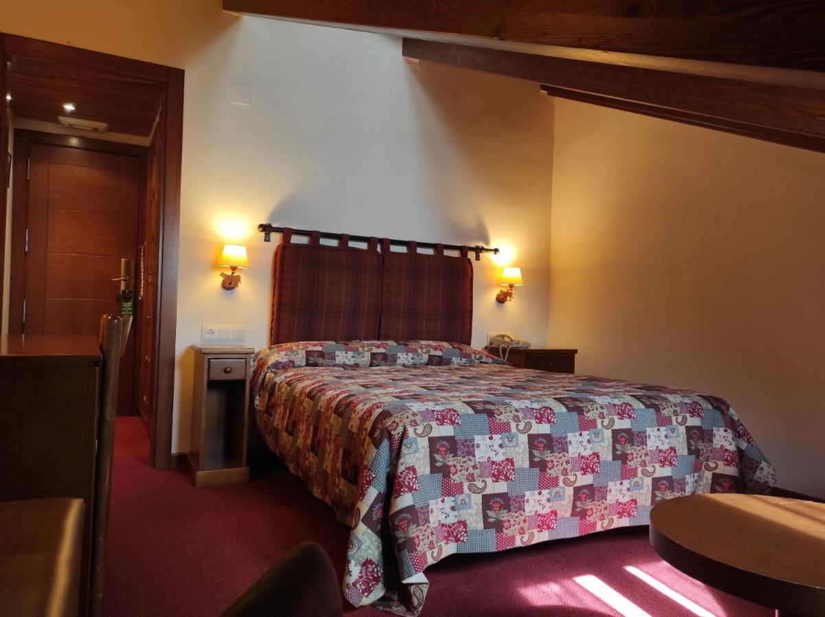 Cama o camas de una habitación en Hotel La Morera