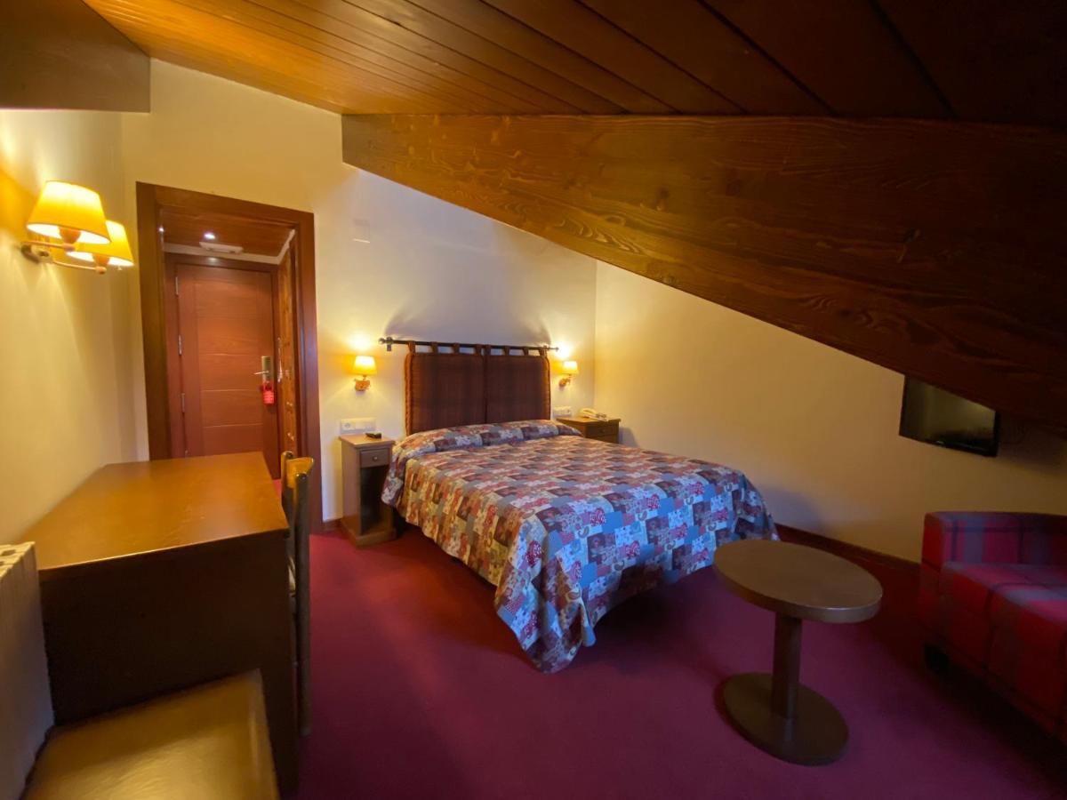 Cama o camas de una habitación en Hotel La Morera