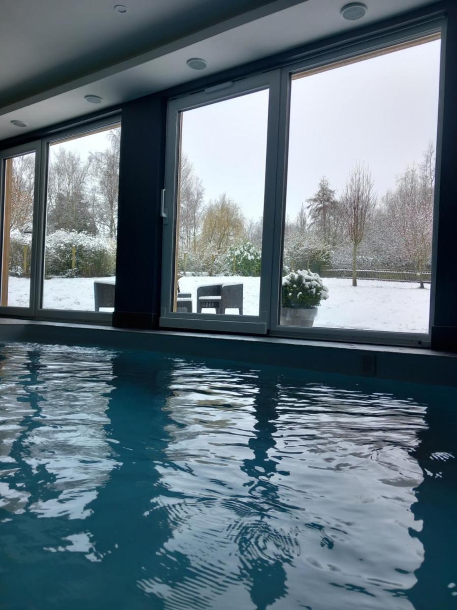 Chambre avec spa, piscine et sauna privatif - Hizvo