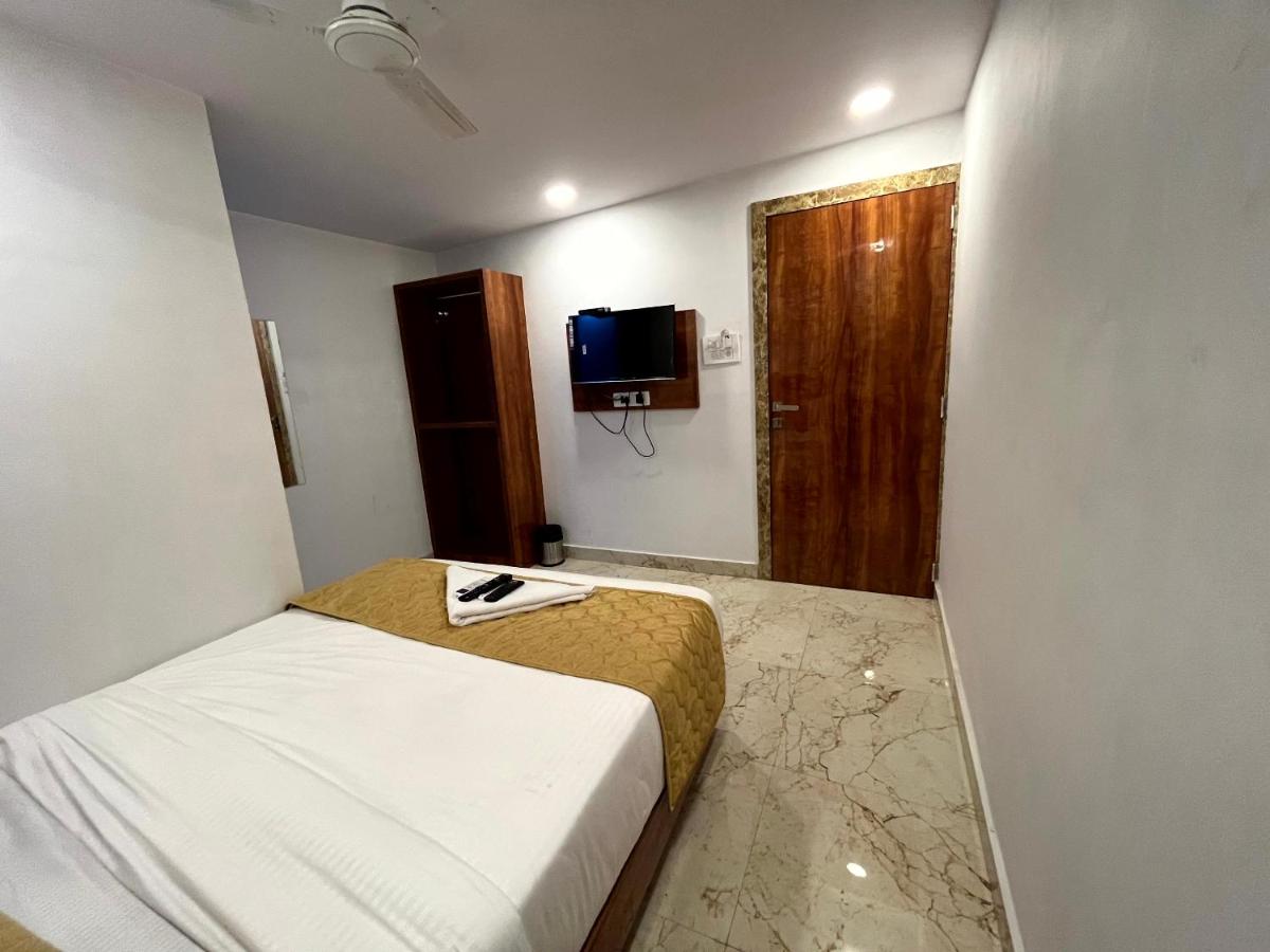 Suitetrails - Hotel Belmond Prime- Near NESCO