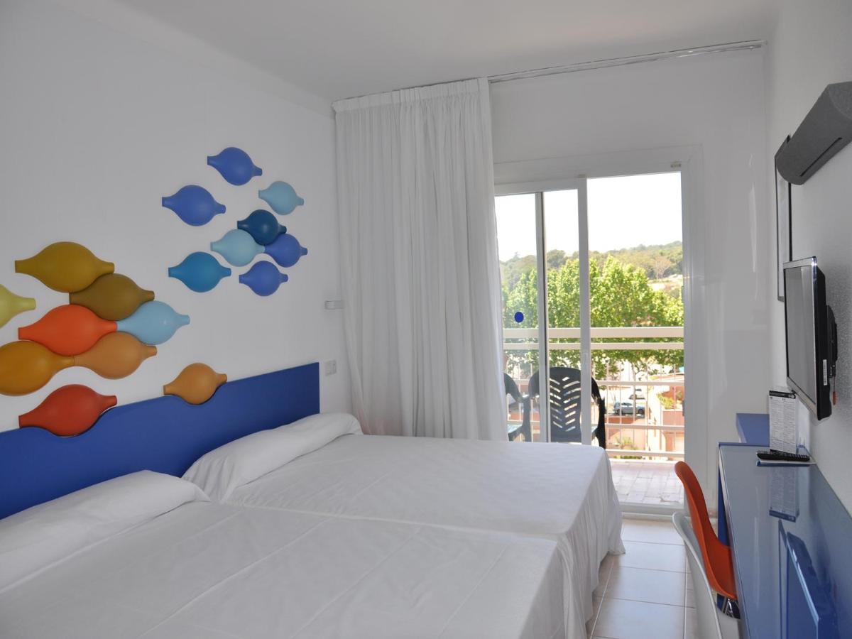Cama o camas de una habitación en Evenia Olympic Resort