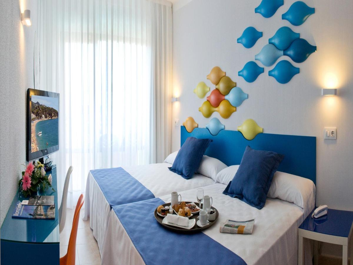 Cama o camas de una habitación en Evenia Olympic Resort