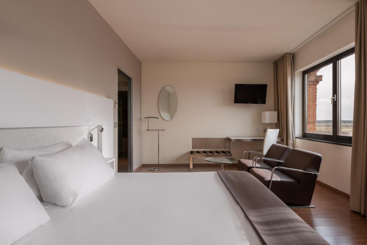 Cama o camas de una habitación en Eurostars Vía de la Plata