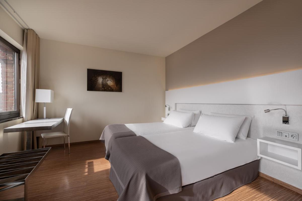 Cama o camas de una habitación en Eurostars Vía de la Plata
