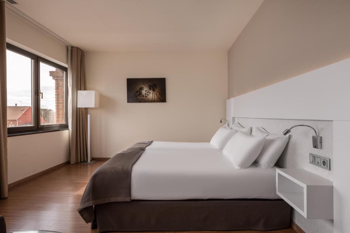 Cama o camas de una habitación en Eurostars Vía de la Plata
