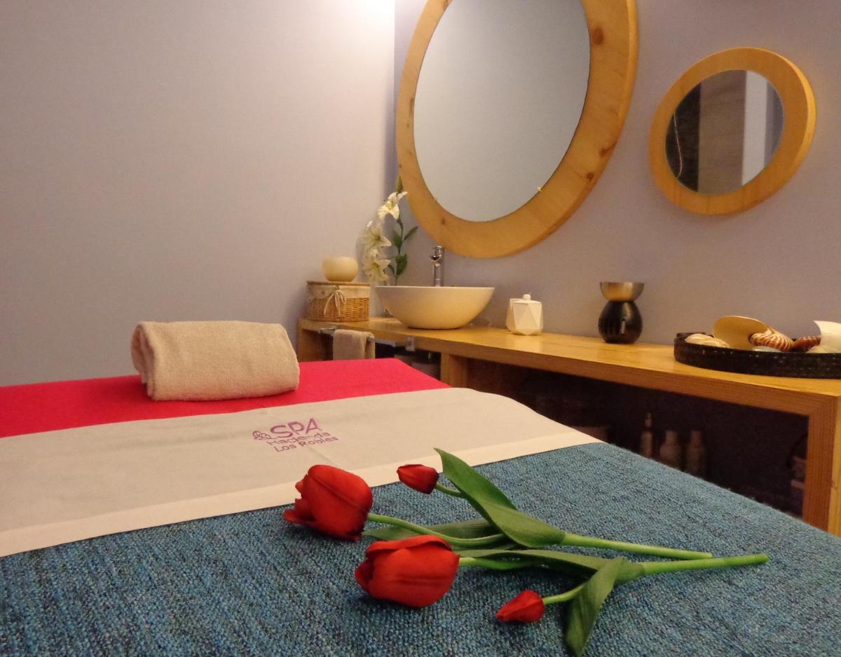 Cama o camas de una habitación en Hotel Rural Spa & Wellness Hacienda Los Robles