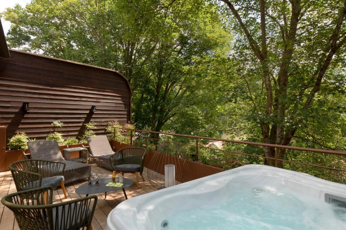 Jardin de l'établissement LA CHENEAUDIÈRE - Hôtel Spa - Relais & Châteaux - Restaurant étoilé