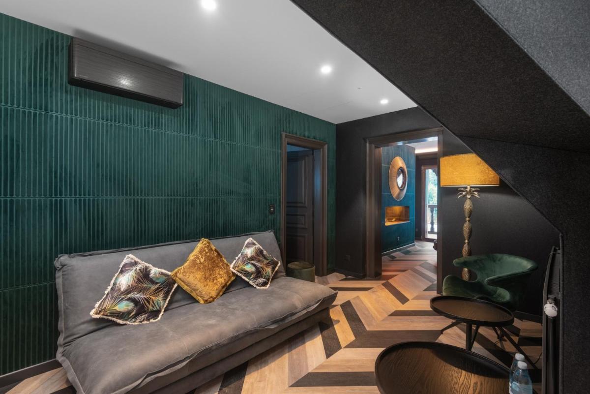 Coin salon dans l'établissement LA CHENEAUDIÈRE - Hôtel Spa - Relais & Châteaux - Restaurant étoilé