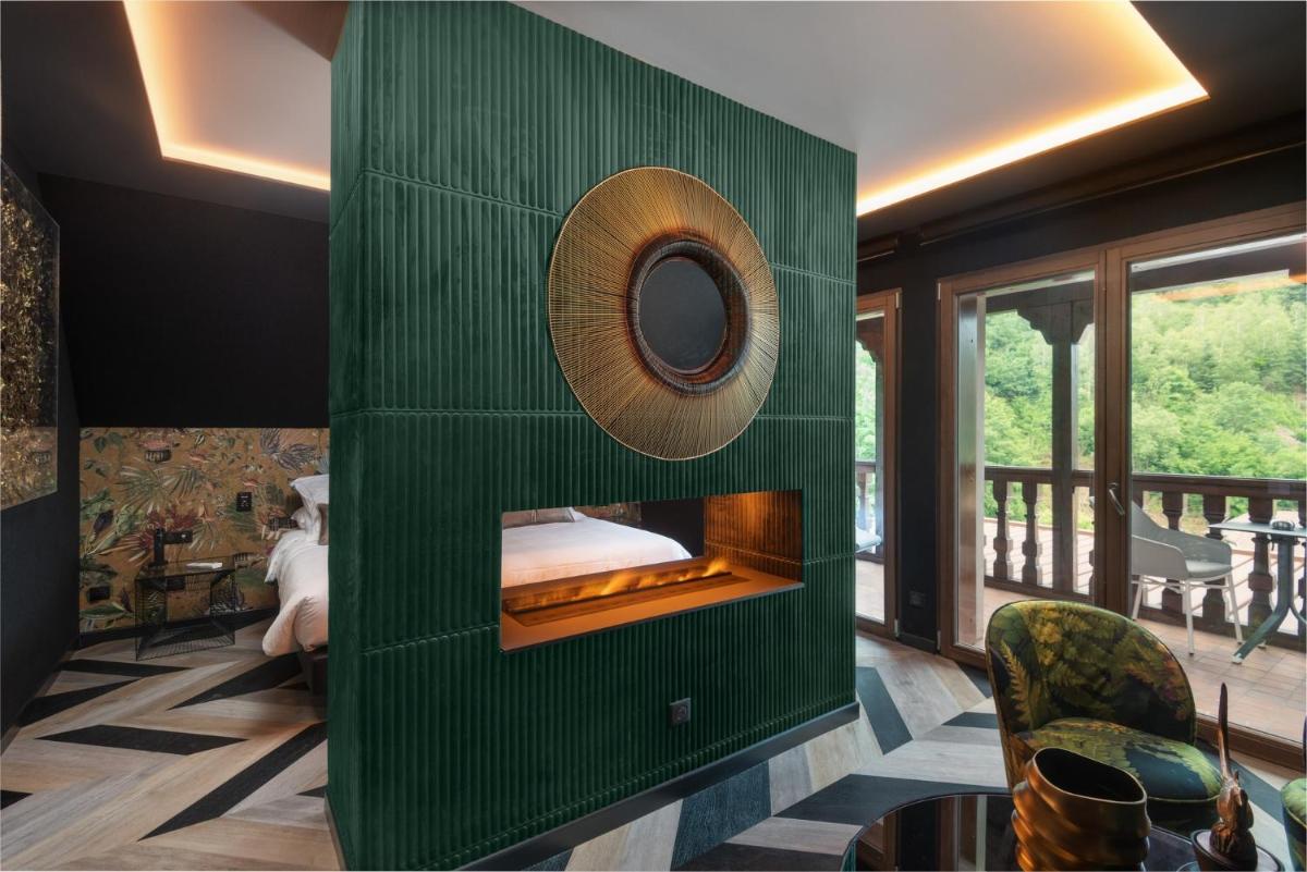 Coin salon dans l'établissement LA CHENEAUDIÈRE - Hôtel Spa - Relais & Châteaux - Restaurant étoilé