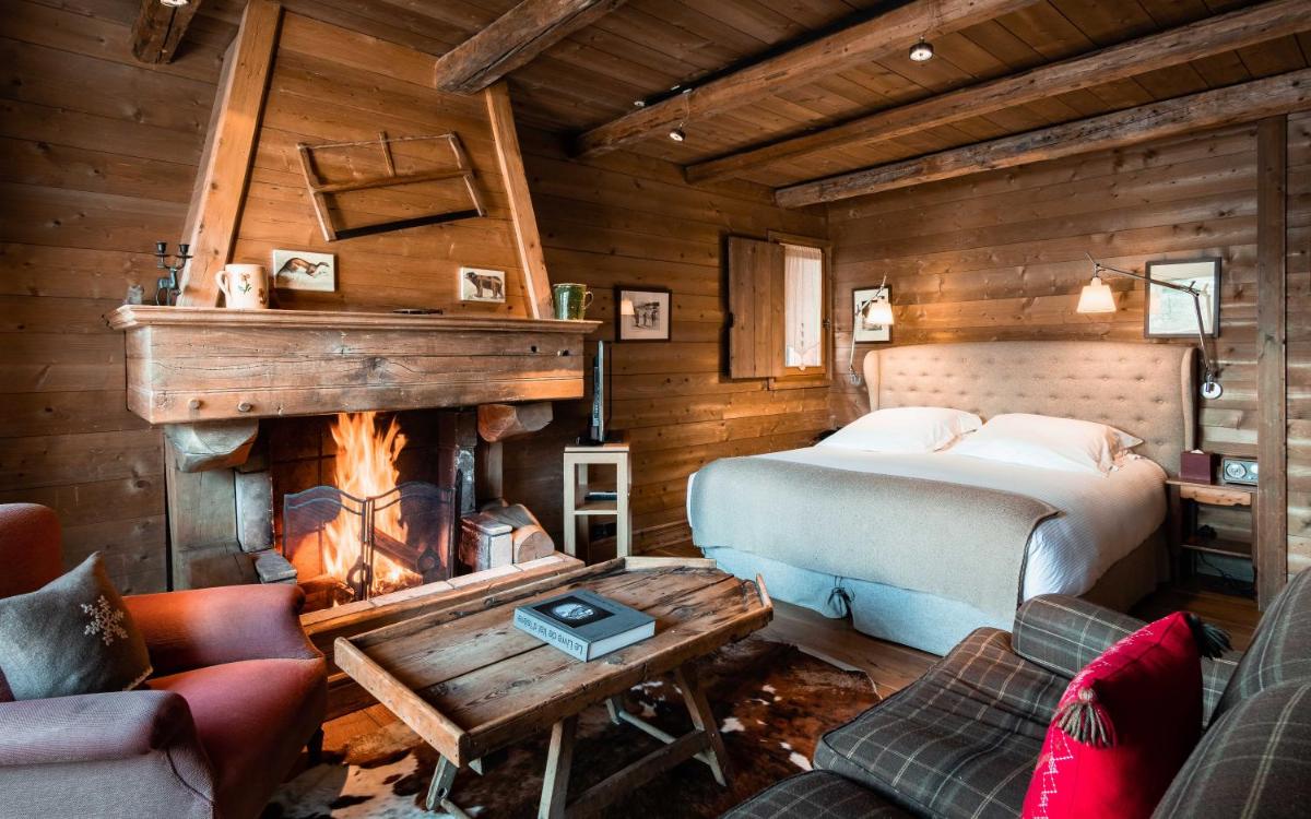 Un ou plusieurs lits dans un hébergement de l'établissement Hôtel LE BLIZZARD