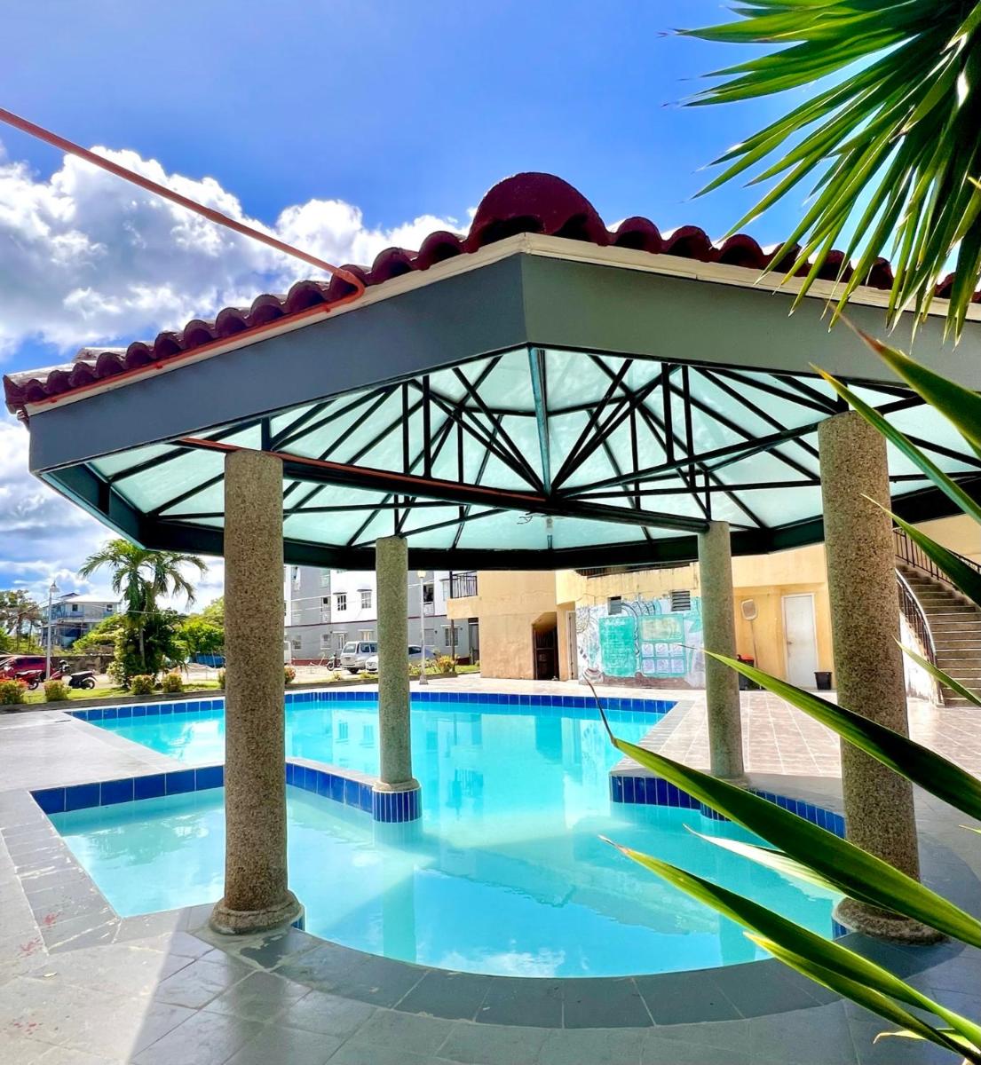 Alex's Place - U403 B11 Mactan Oasis Gardens Condominium No elevator - Housity