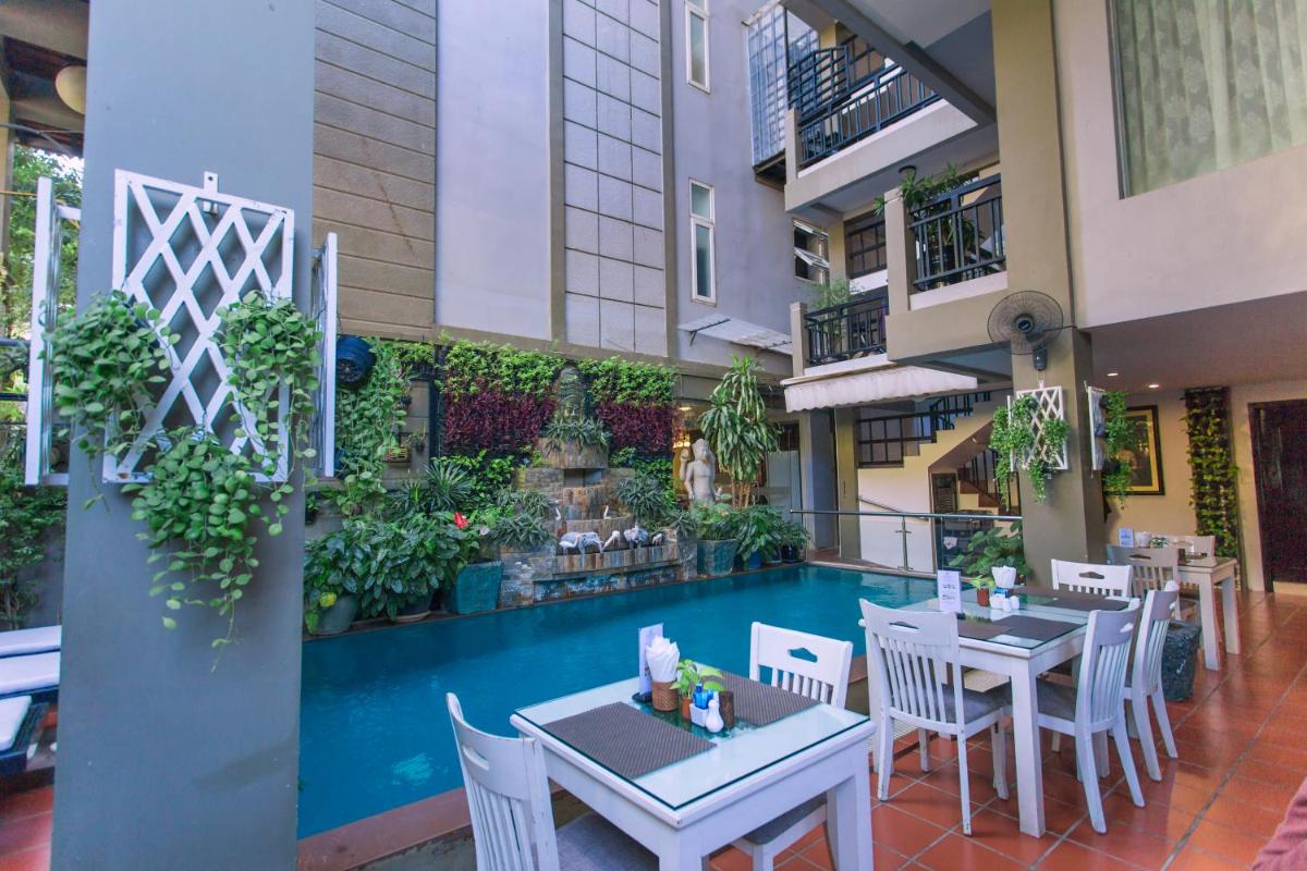 King Grand Boutique Hotel - Housity