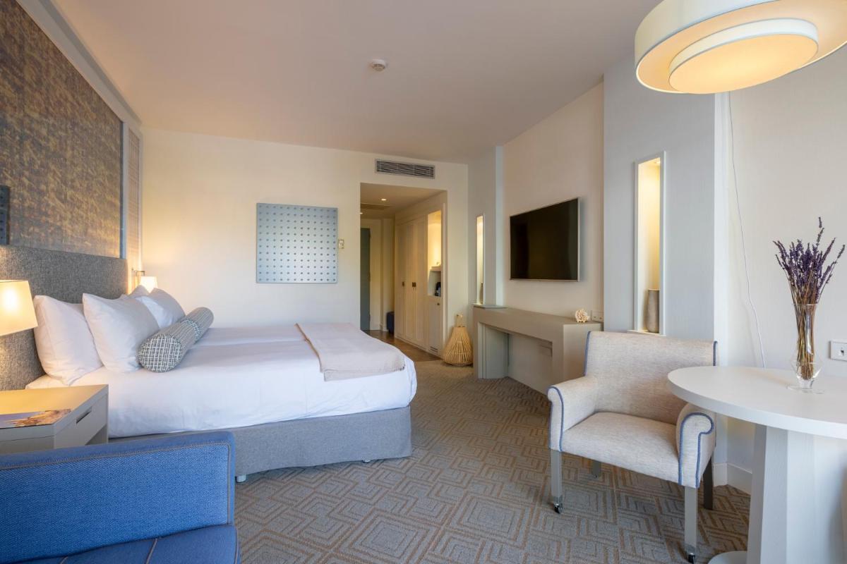 Cama o camas de una habitación en Eurostars Sitges
