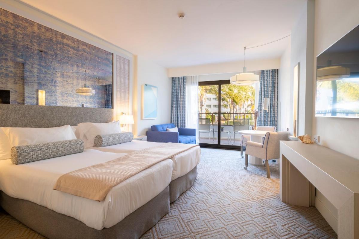 Cama o camas de una habitación en Eurostars Sitges