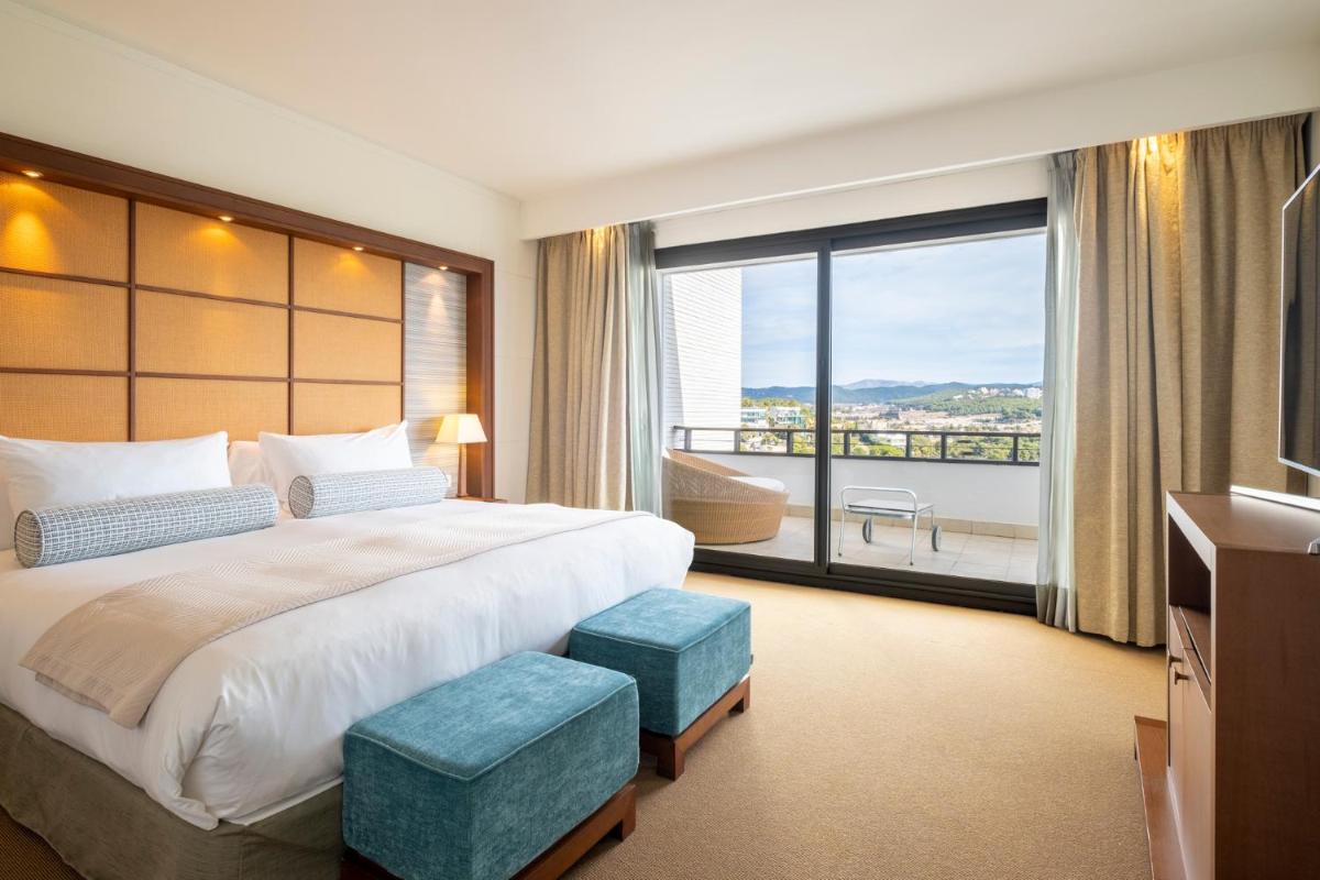 Cama o camas de una habitación en Eurostars Sitges