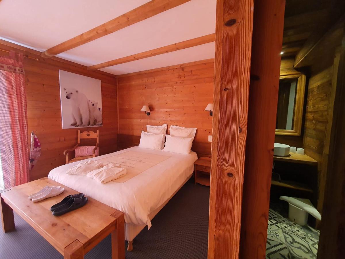 Un ou plusieurs lits dans un hébergement de l'établissement Café-Hôtel Le Morillon, Domaine du Grand Massif-Samoëns