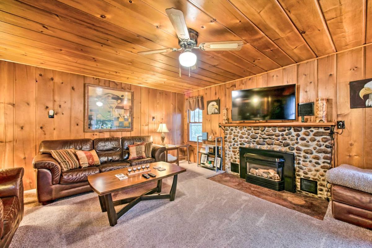 East Tawas Cabin with Deck, Backyard and Fire Pit! - Housity