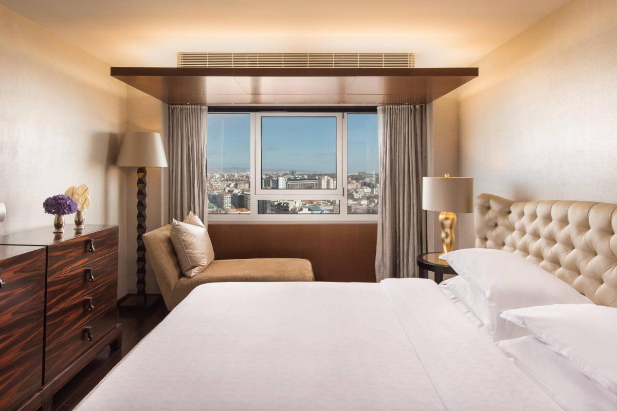 Uma cama ou camas num quarto em Sheraton Lisboa Hotel & Spa