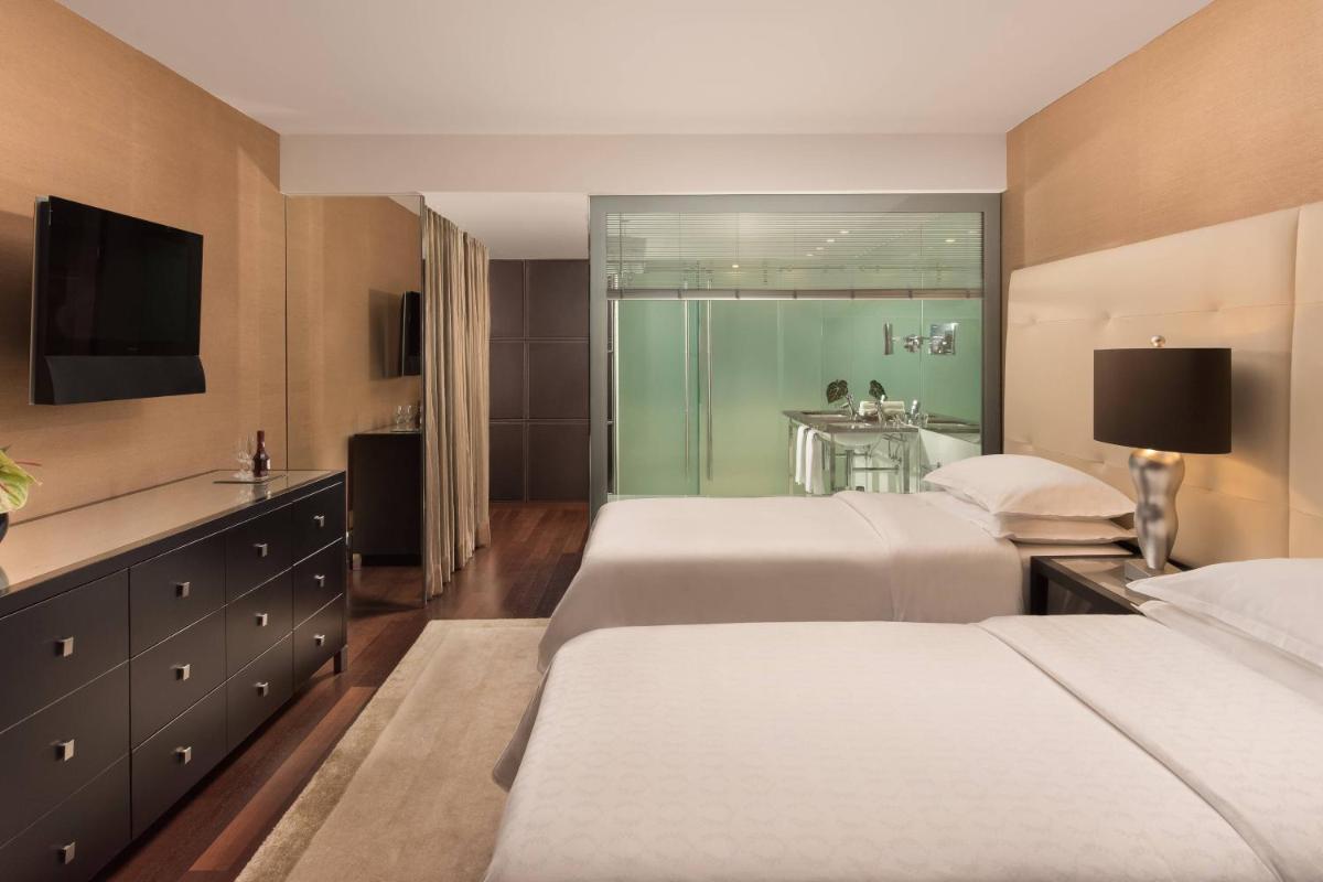 Uma cama ou camas num quarto em Sheraton Lisboa Hotel & Spa