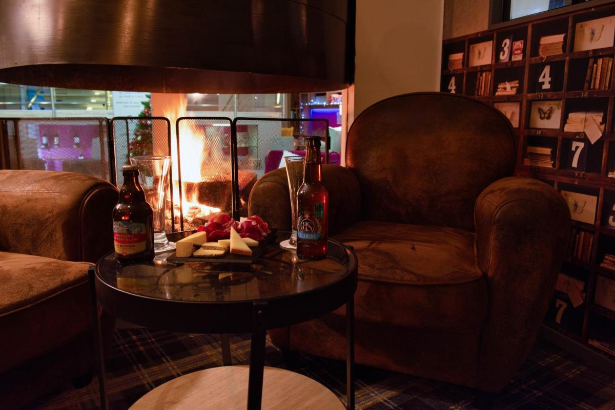 Coin salon dans l'établissement Mercure Annecy Sud