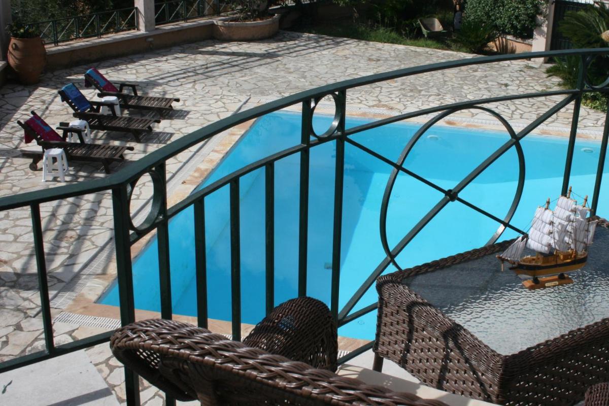 Durrell Corfu Strawberry-Pink Villa - Housity