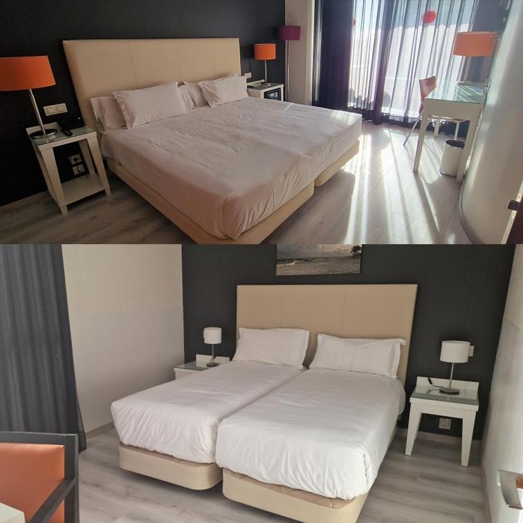 Cama o camas de una habitación en Hotel Balneario Playa de Comarruga