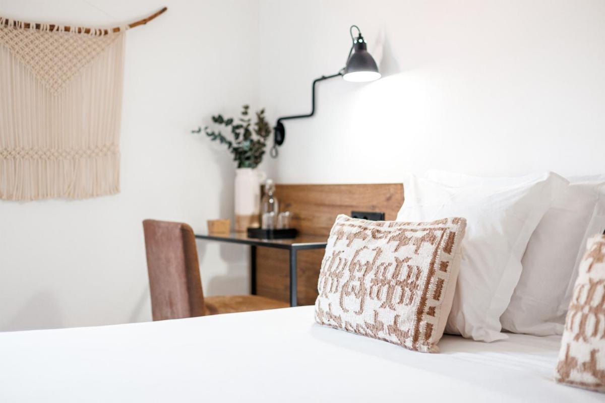 Uma cama ou camas num quarto em Lamego Hotel & Life