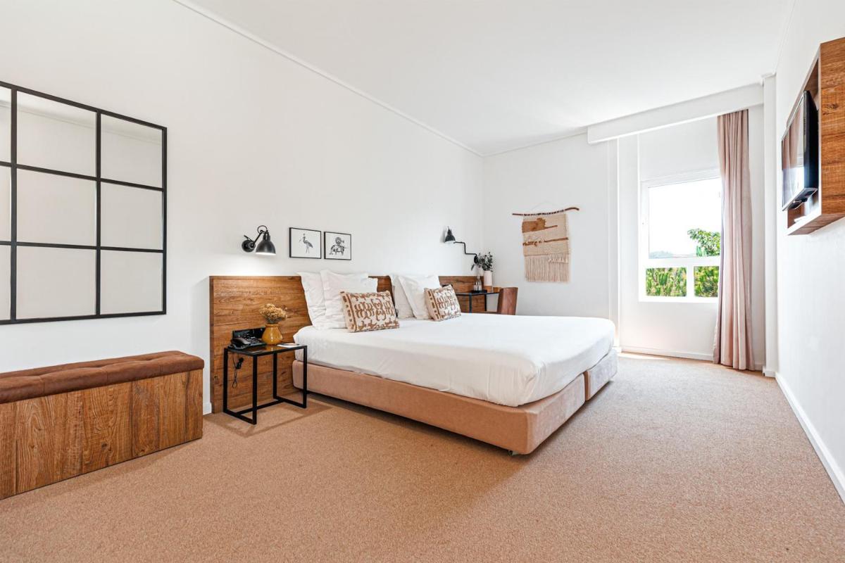 Uma cama ou camas num quarto em Lamego Hotel & Life