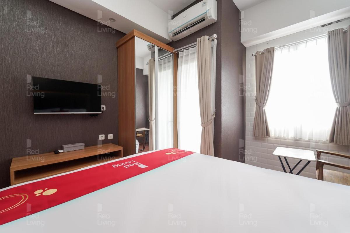RedLiving Apartemen Transpark Juanda - Kamarku Tower Jade with Netflix - Housity