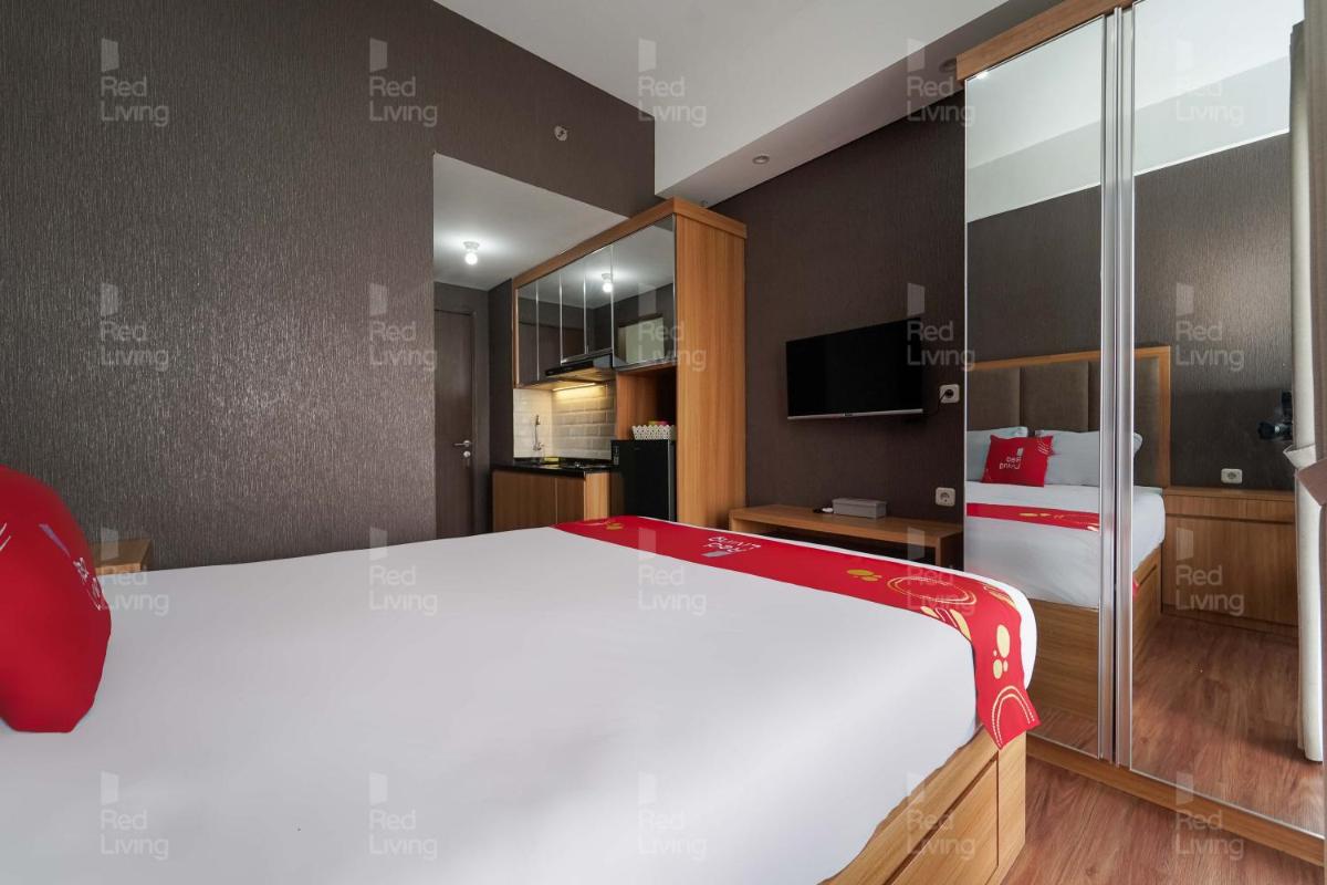 RedLiving Apartemen Transpark Juanda - Kamarku Tower Jade with Netflix - Housity