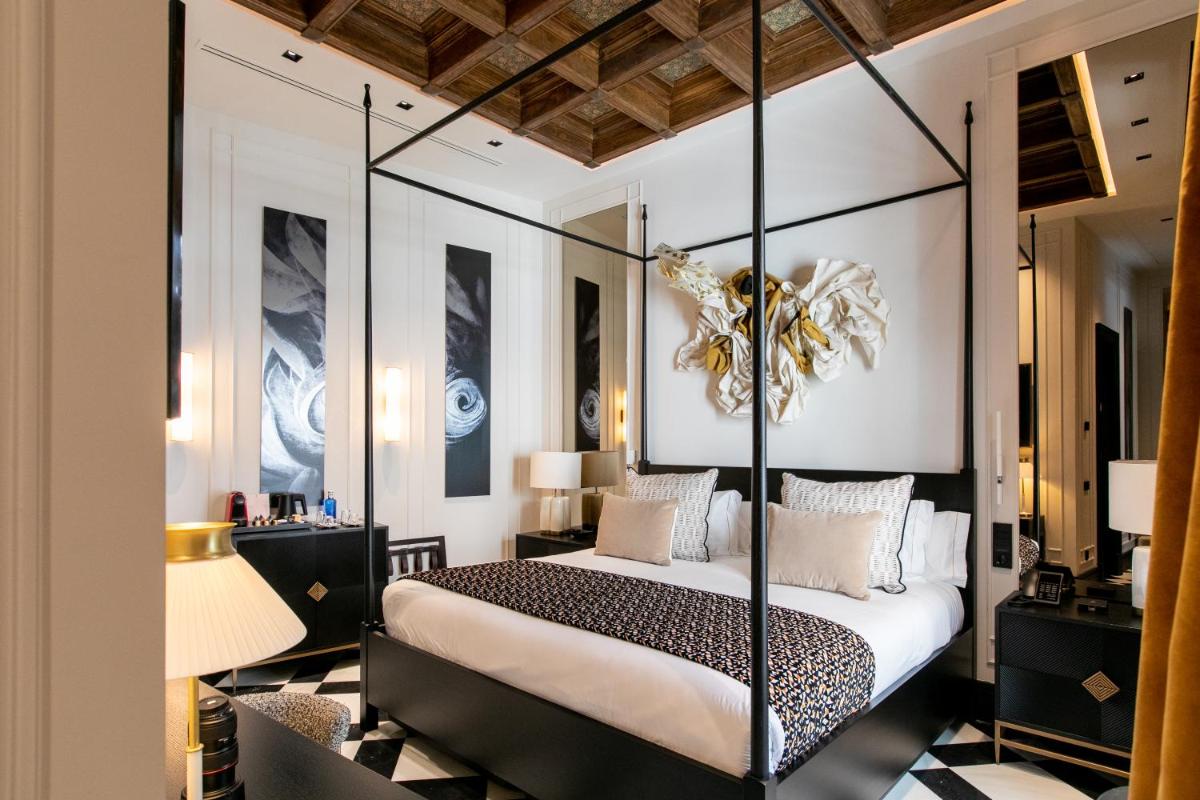 Cama o camas de una habitación en Hotel Casa Palacio Don Ramón