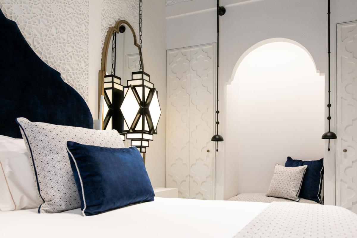 Cama o camas de una habitación en Hotel Casa Palacio Don Ramón