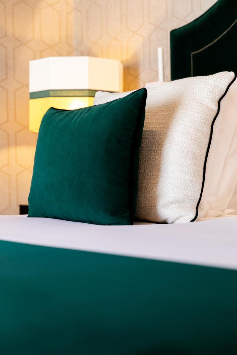 Cama o camas de una habitación en Hotel Casa Palacio Don Ramón