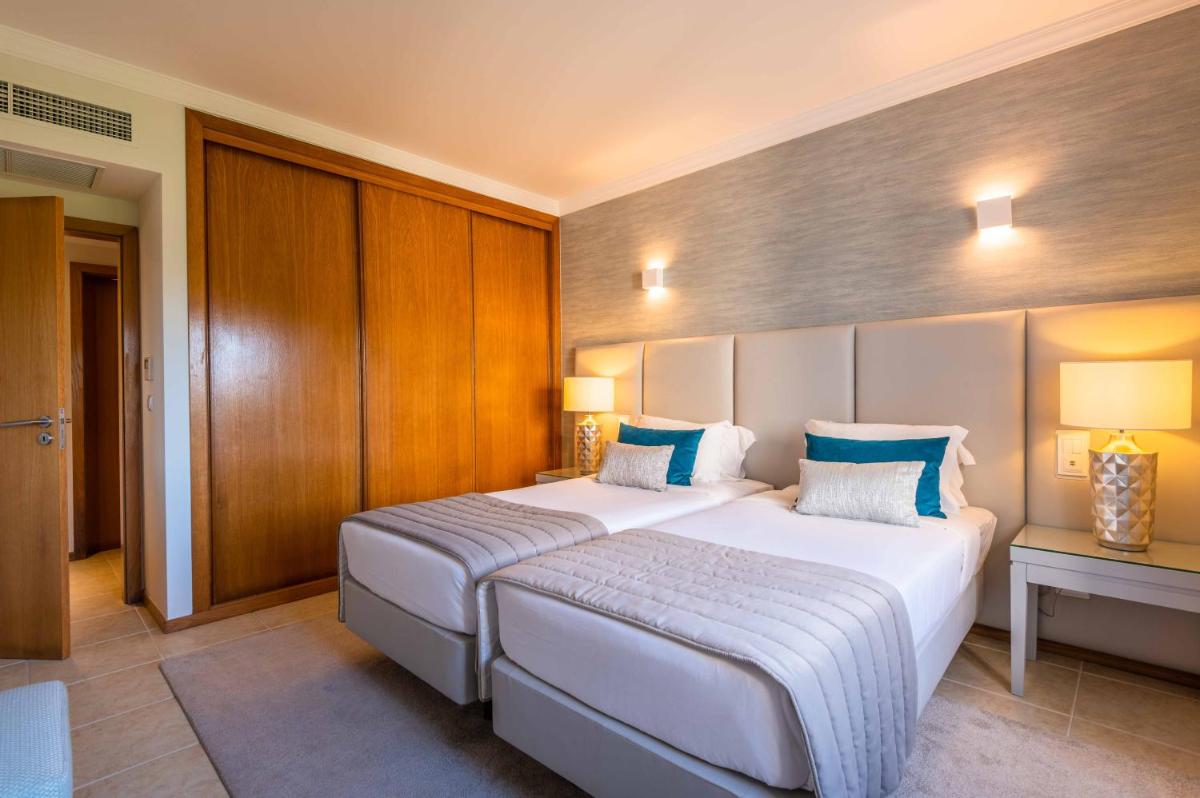 Uma cama ou camas num quarto em Vale d'Oliveiras Quinta Resort & Spa