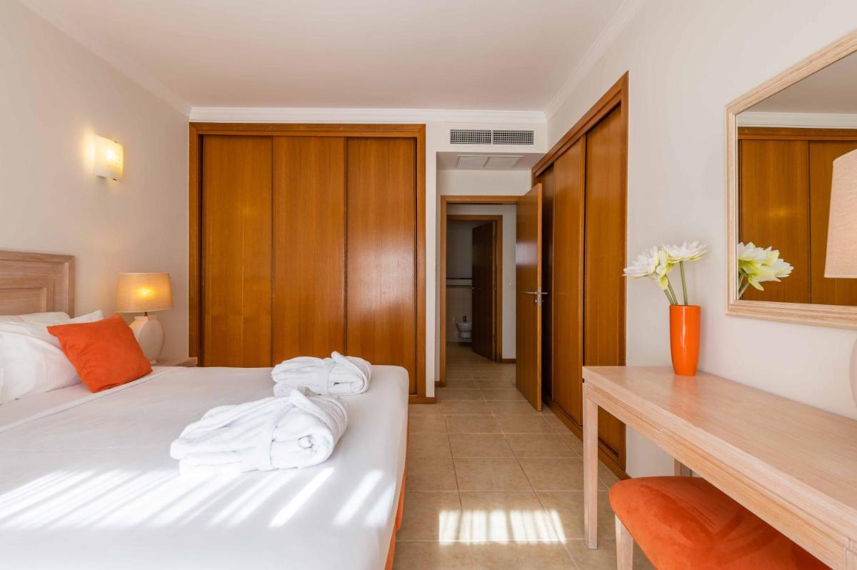 Uma cama ou camas num quarto em Vale d'Oliveiras Quinta Resort & Spa