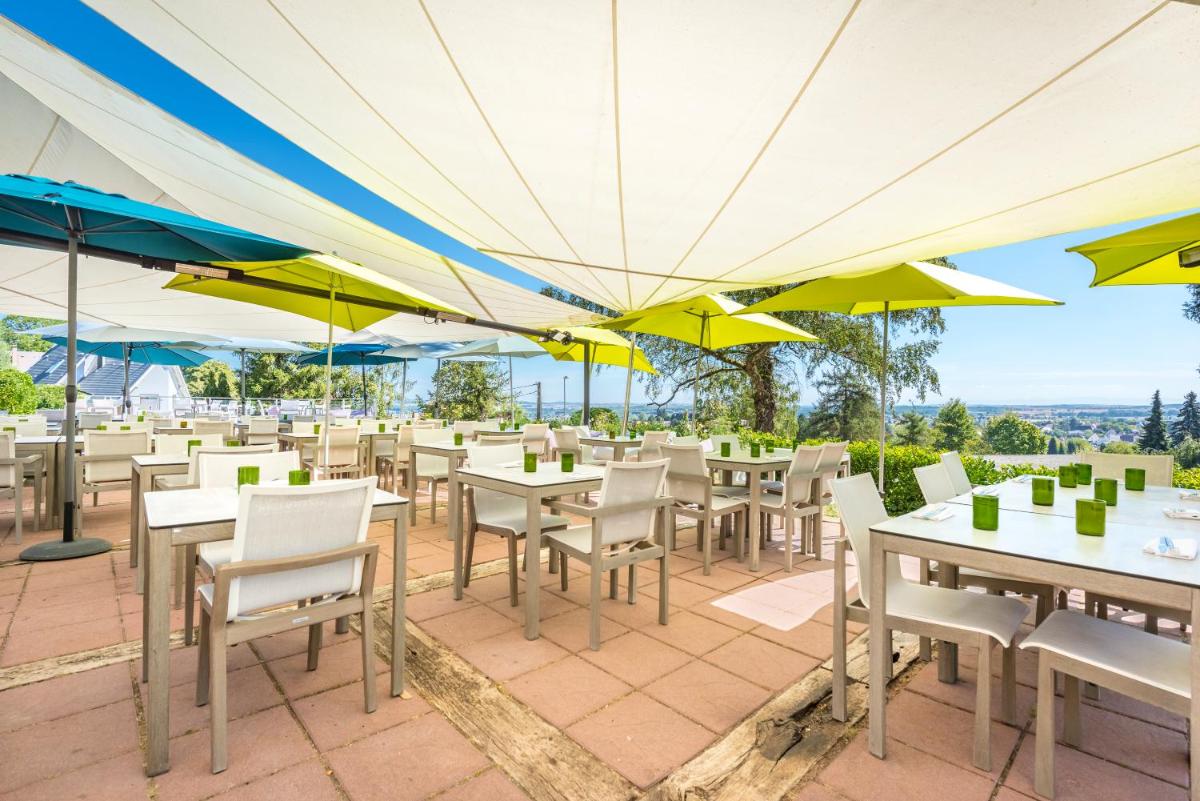 Restaurant ou autre lieu de restauration dans l'établissement Hôtel La Garenne