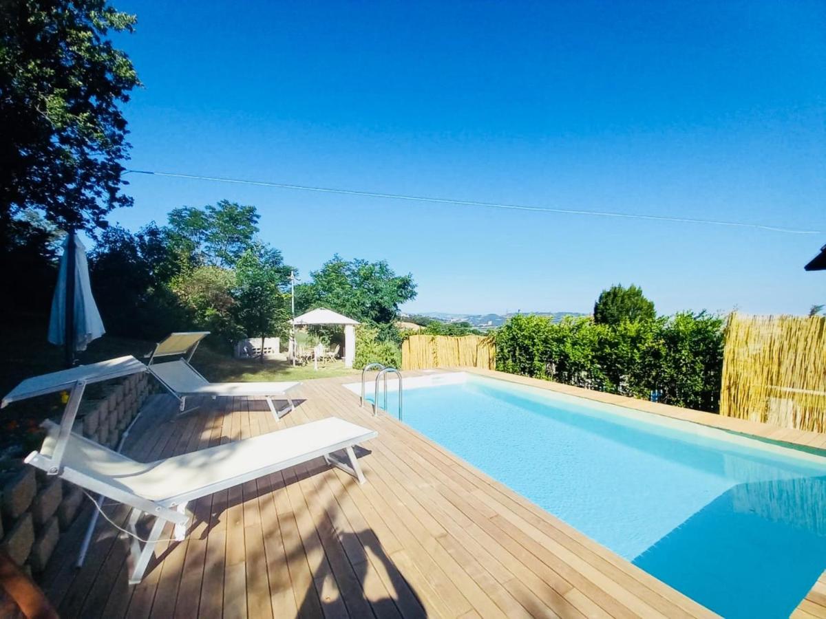 Charming house in Montelabbate with shared pool - Housity
