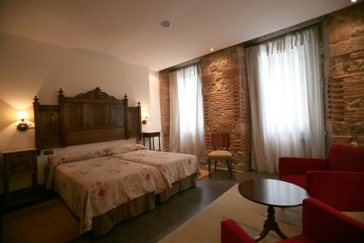Cama o camas de una habitación en Hotel Balneario La Hermida