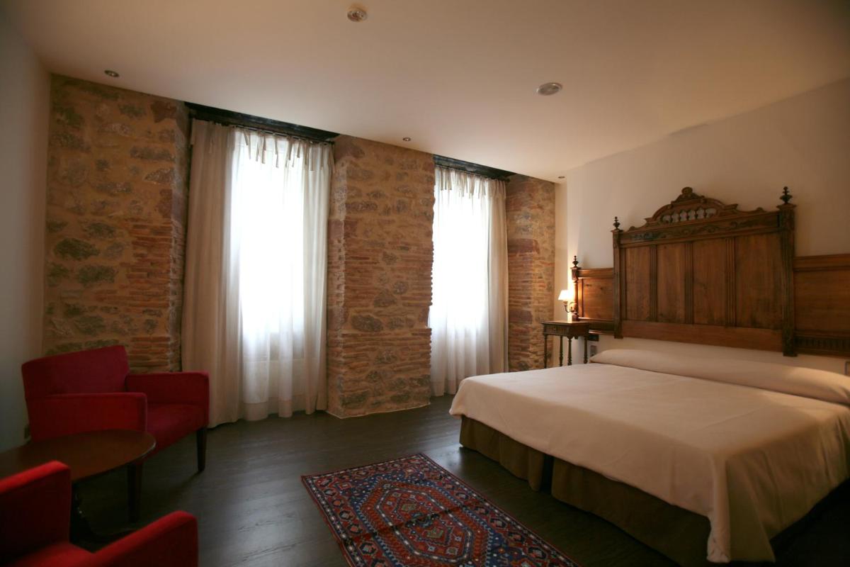 Cama o camas de una habitación en Hotel Balneario La Hermida