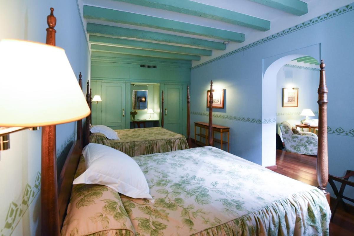 Cama o camas de una habitación en Hotel Las Casas de la Judería