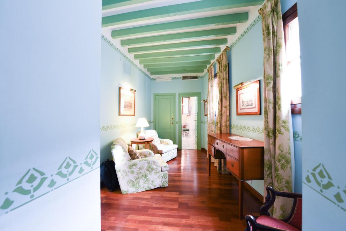 Cama o camas de una habitación en Hotel Las Casas de la Judería