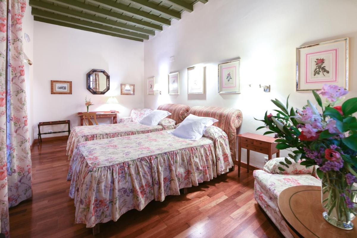 Cama o camas de una habitación en Hotel Las Casas de la Judería