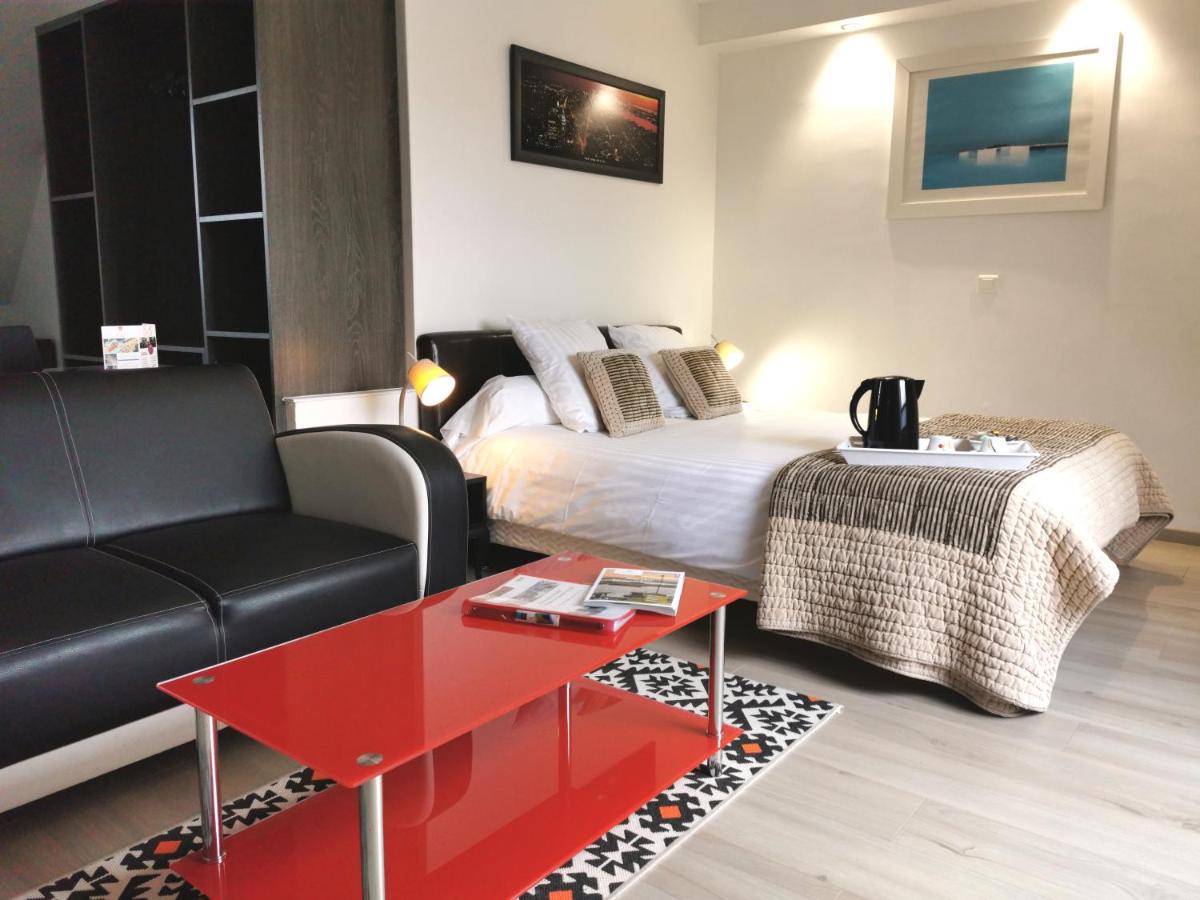 Un ou plusieurs lits dans un hébergement de l'établissement Les Terrasses de Saumur - Hôtel & Appartements - Restaurant & Spa (Logis)